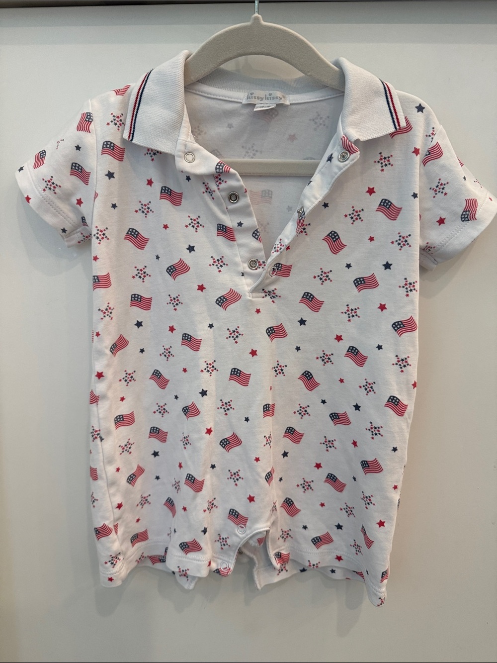Kissy Kissy White Polo Romper with Red & Blue Flag Print